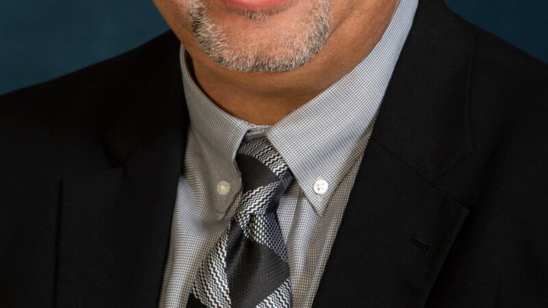 Dr. Pervis Evans